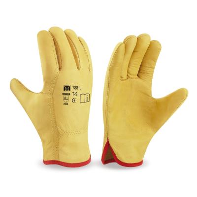 Guante tipo conductor flor vacuno amarillo con ribete. 8