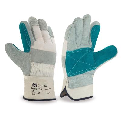 Guante tipo americano mixto de serraje vacuno1ª/lona reforzado en palma, índice y pulgar. anguito rígido y costuras de refuerzo.